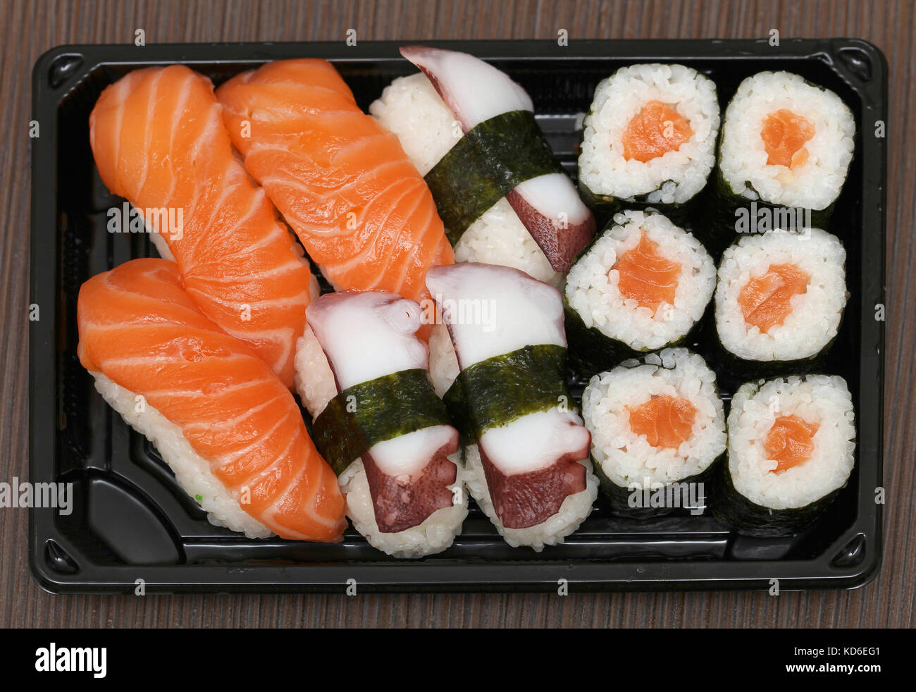 Assortment of fresh Japanese sushi with raw fish Stock Photo - Alamy
