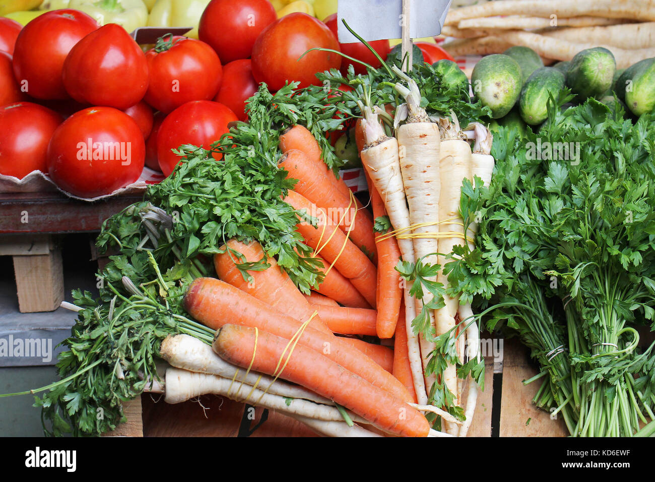 Fresh organic vegetables sold on market stall Stock Photo - Alamy
