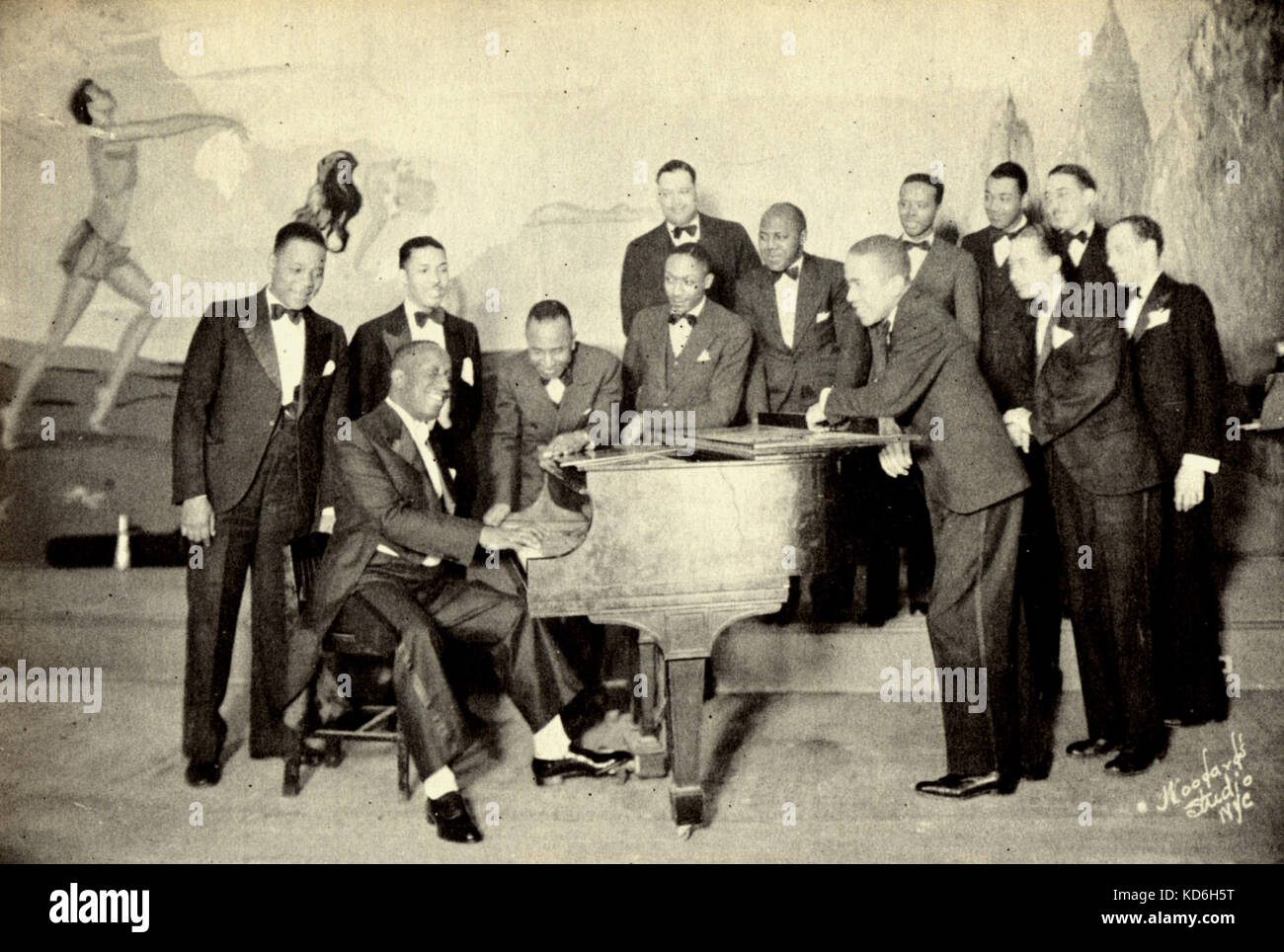 James P. Johnson, American composer and pianist, at the piano with the band he led at the Apollo Theatre and Small's Paradise in Harlem, 1934-35. (1894-1955) Stock Photo