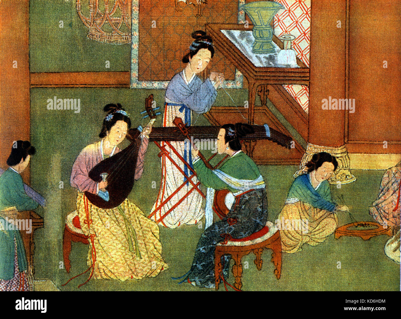 Chinese music ensemble from left to right: Pipa (lute) player, Gu Qin  (zither) player, Yueh Qin (moon guitar) player Stock Photo - Alamy