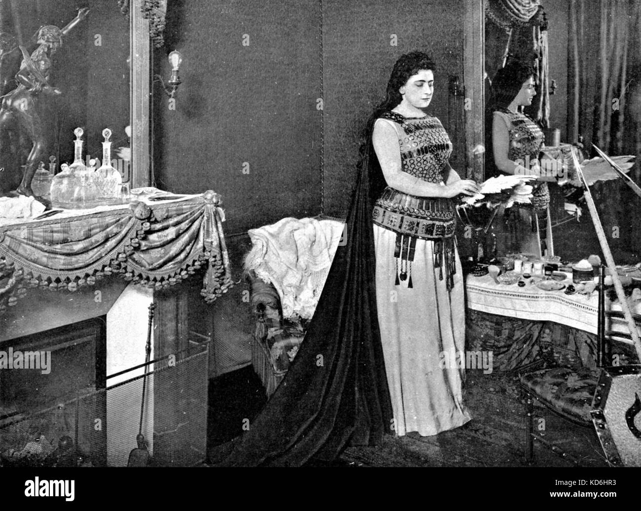 Lucienne Bréval in her dressing-room at the Opéra in Paris, 1898.  At the time of her performance in  'Die Walküre', dressed as Brünnhilde.   Swiss born French soprano, 1869-1935.   Photo H. Mairet.  Le Théâtre, April 1898. Stock Photo