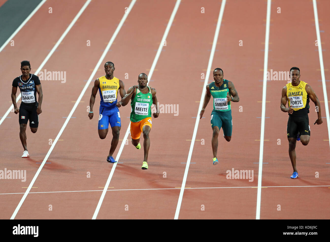 Julian FORTE (Jamaica), Akani SIMBINE (South Africa), Ben Youssef MEITÉ (Côte d'Ivoire, Ivory Coast), Mario BURKE (Barbados), Hassan SAAID (Maldives) competing in the Men's 100m Heat 3 at the 2017, IAAF World Championships, Queen Elizabeth Olympic Park, Stratford, London, UK. Stock Photo