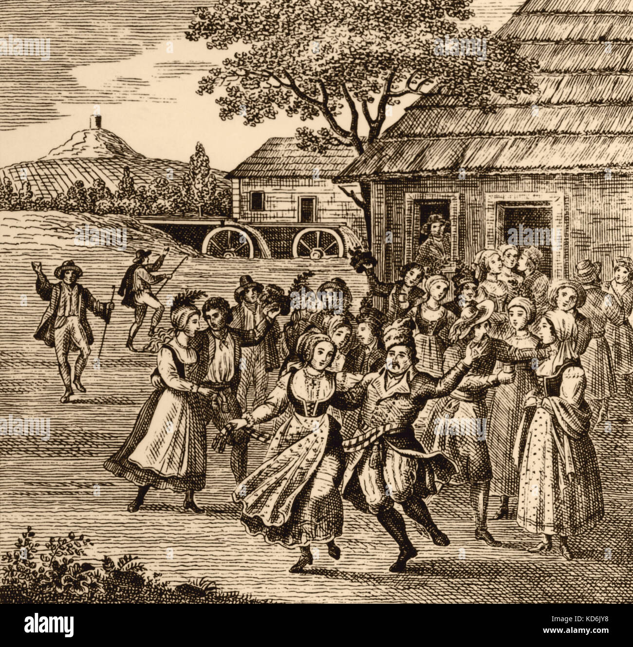 DANCE - Mazurka  being danced by man and woman in Polish village with people around them. ( Mazurka - Polish national dance dating at least as far back as the 16th century. - Chopin wrote music based on Mazurka. Stock Photo