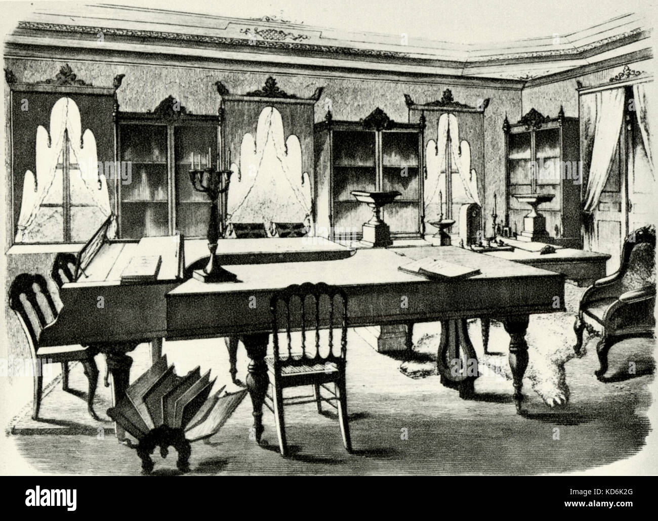 The library in 'L' Altenburg', the villa in Weimar where Liszt and Princess Sayn-Wittgenstein lived from 1848 to 1860. Erard grand piano (left) and Beethoven's Broadwood piano. After contemporary engraving.   Hungarian pianist and composer, 1811-1886. Stock Photo