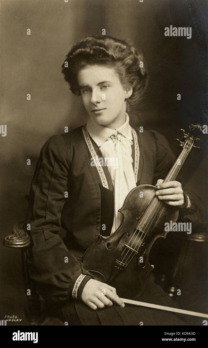 Marie Hall holding violin. English violinist, 18841956. Photo Barnes