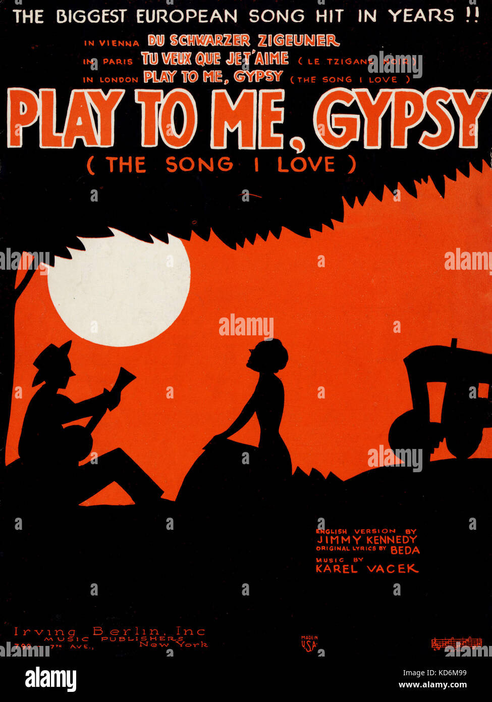 Score cover for the song 'Play to Me, Gypsy (the Song I Love)', 'Du Schwarzer Zigeuner', 'Tu Veux Que Je T'Aime (Le Tzigane Noir). Published by Irving Berlin, Inc., New York, 1932. Music by Karel Vacek.  Score cover showing gypsy encampment - silhouette of woman with man playing guitar under a moonlit sky. Stock Photo