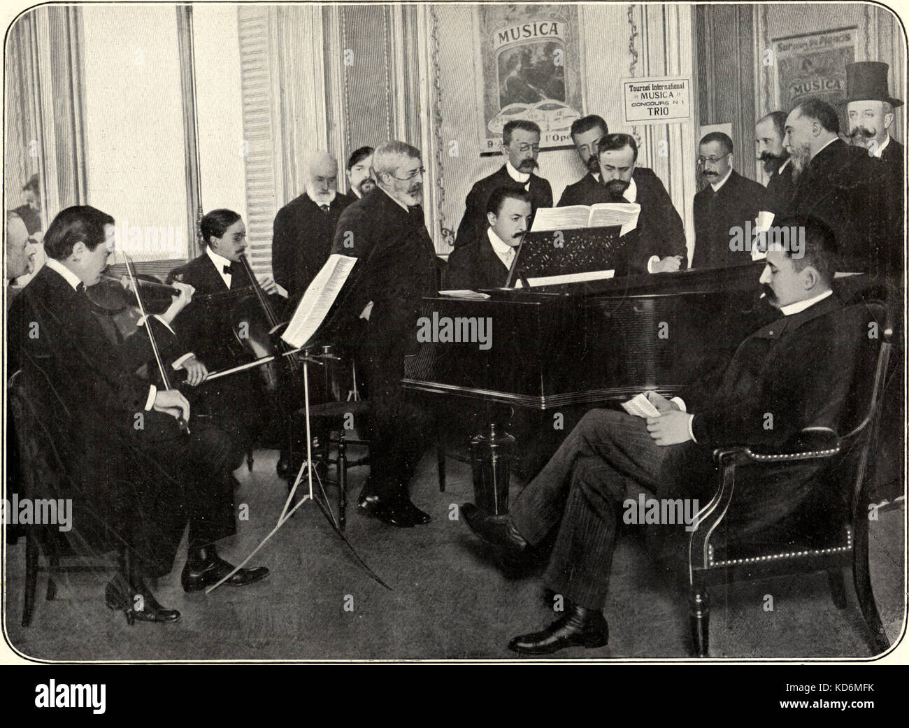 Jury of Musica trio contest, December 1903. From left to right: director of piano manufacturers Erard Mr Blondel, violinist Mr Alexanian, Musica editor A. Durand, composer Claude Debussy, conductor Mr Taffanel, composer Moritz Moszkowski  / Moskowski, pianist Aimé Lachaume, composer Pierre Lalo, composer Paul Dukas, composer André Dedalge, editor E. Fromont, opera librarian Charles Malherbe, violinist Armand Parent, critic Henry Gauthier-Villars. Stock Photo