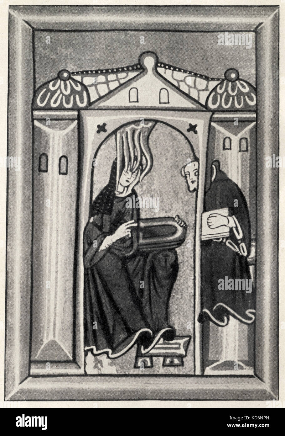 HILDEGARD von Bingen, Saint. Her composing is inspired by the Holy Spirit around her head.  Illustration from Codex at Wiesbaden German abbess and musician (1098-1179)   She wrote monophonic music for the church which shows some departures from traditional plainsong style. Stock Photo