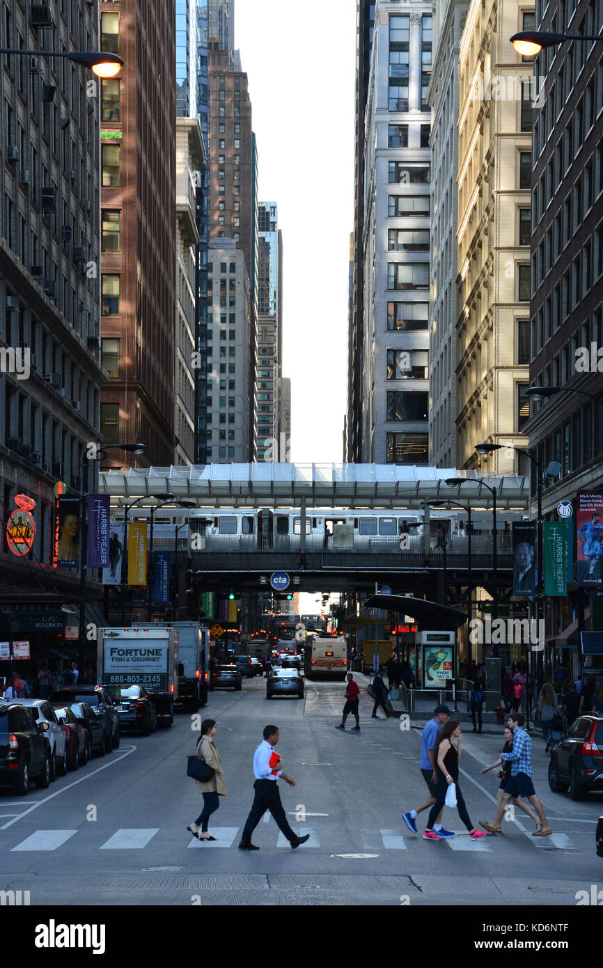 Looking west into the building canyon down Washington Blvd. from Michigan Ave. in Chicago's downtown Loop business district. Stock Photo