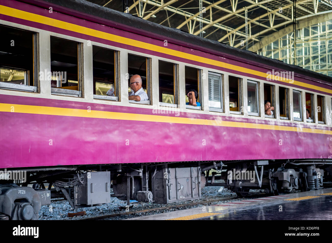 Passengers Sit Waiting On The Train At A Platform In Hua Lamphong Stock Photo Alamy