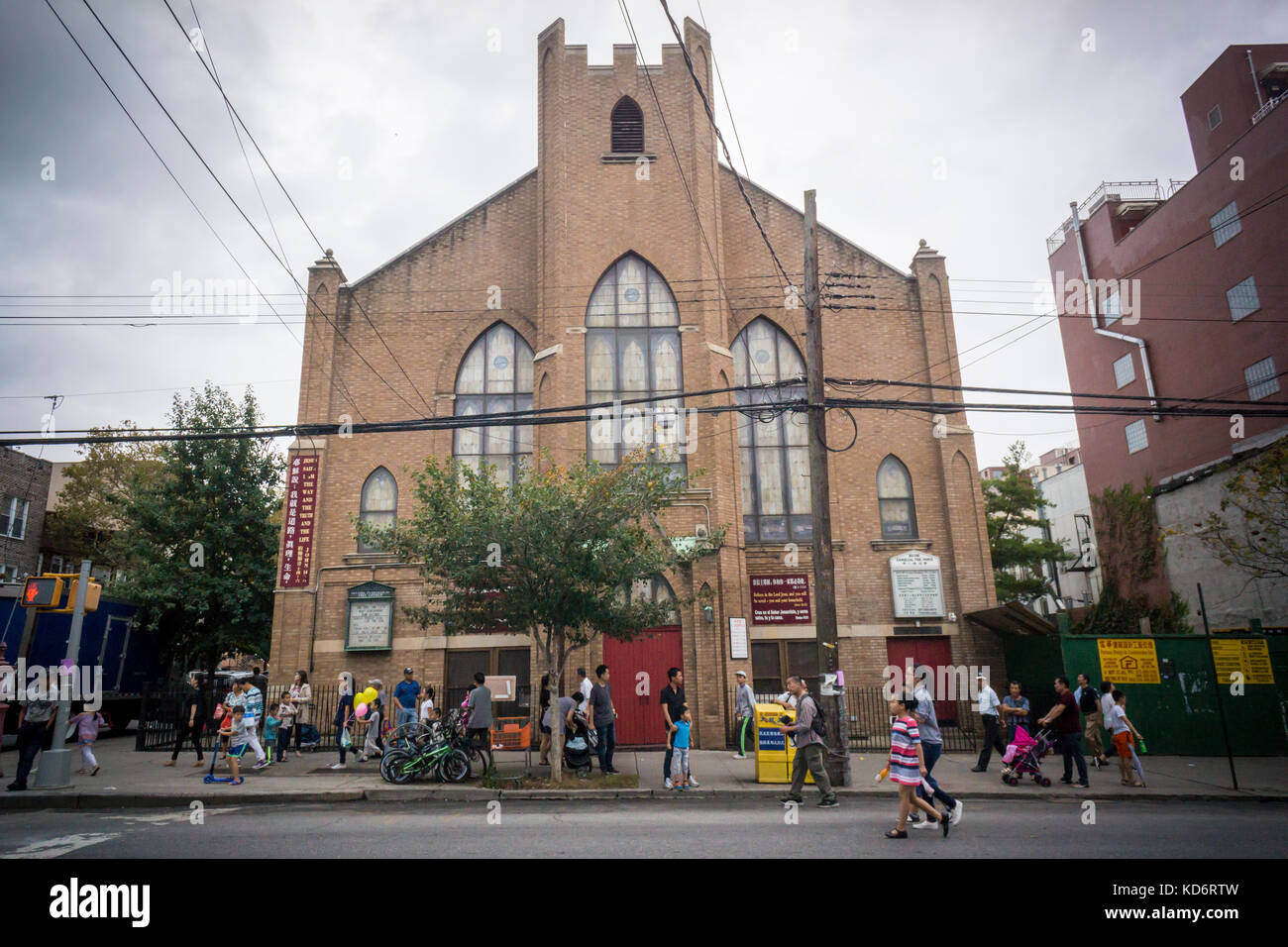 Second Evangelical Free Church on Eighth Avenue in the Sunset Park neighborhood in Brooklyn in New York on Sunday, October 8, 2017 during the Autumn Moon and Lantern Parade. Sunset Park has become Brooklyn's Chinatown as Chinese and other Asian groups have moved there and businesses have sprouted up to cater to them. The Lonely Planet travel guide has listed Sunset Park as one of the top ten coolest neighborhoods in the U.S. (© Richard B. Levine) Stock Photo