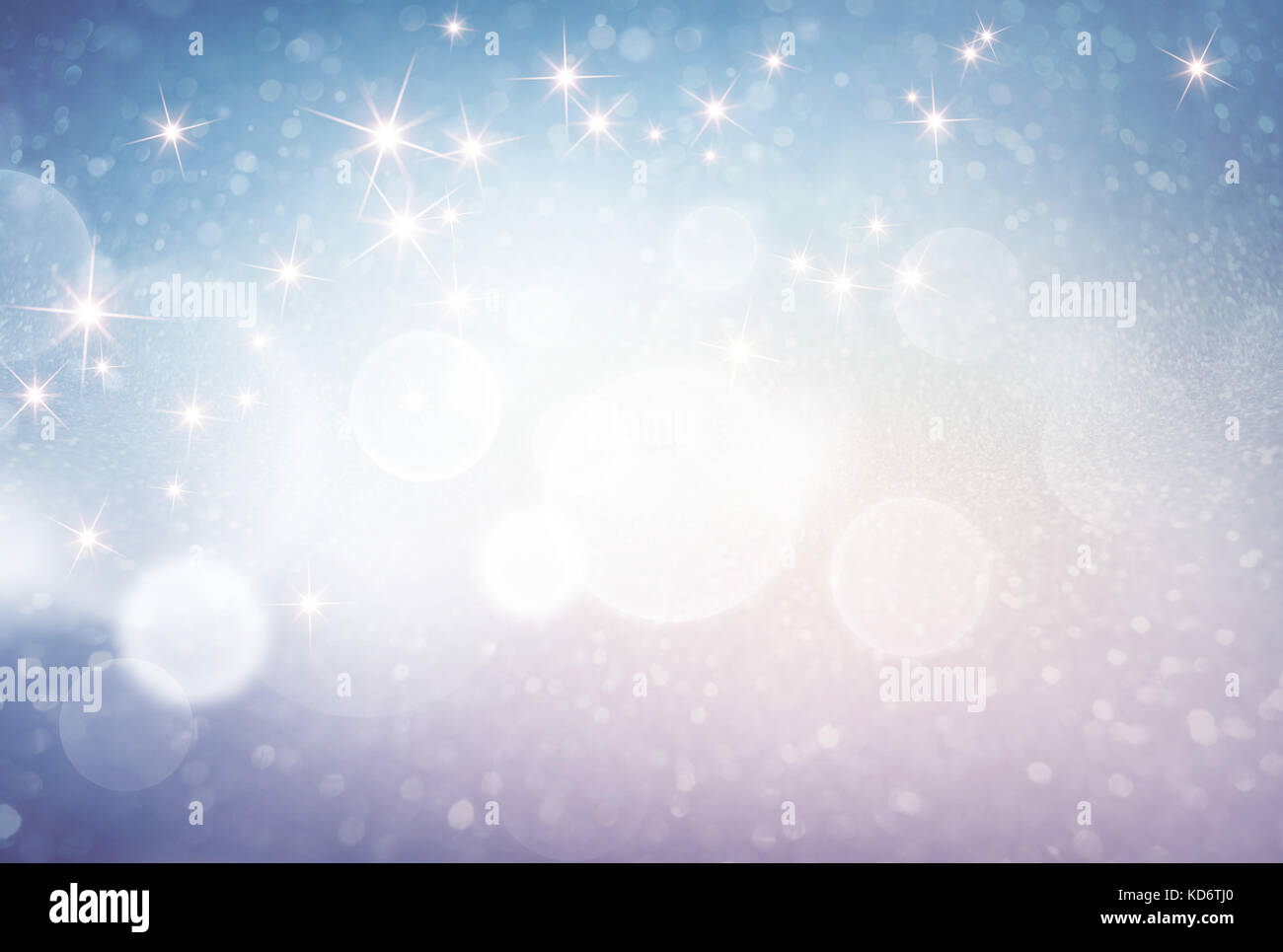 Glittering background with star lights and blur effect - Festive material Stock Photo