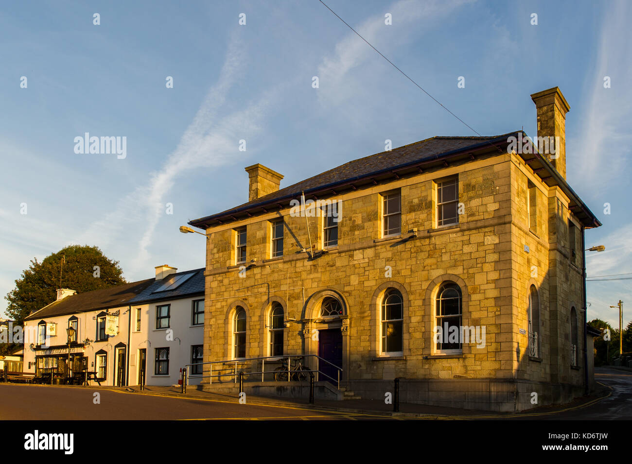 Disused bank building in Schull, West Cork, Ireland at sunrise with copy space. Stock Photo