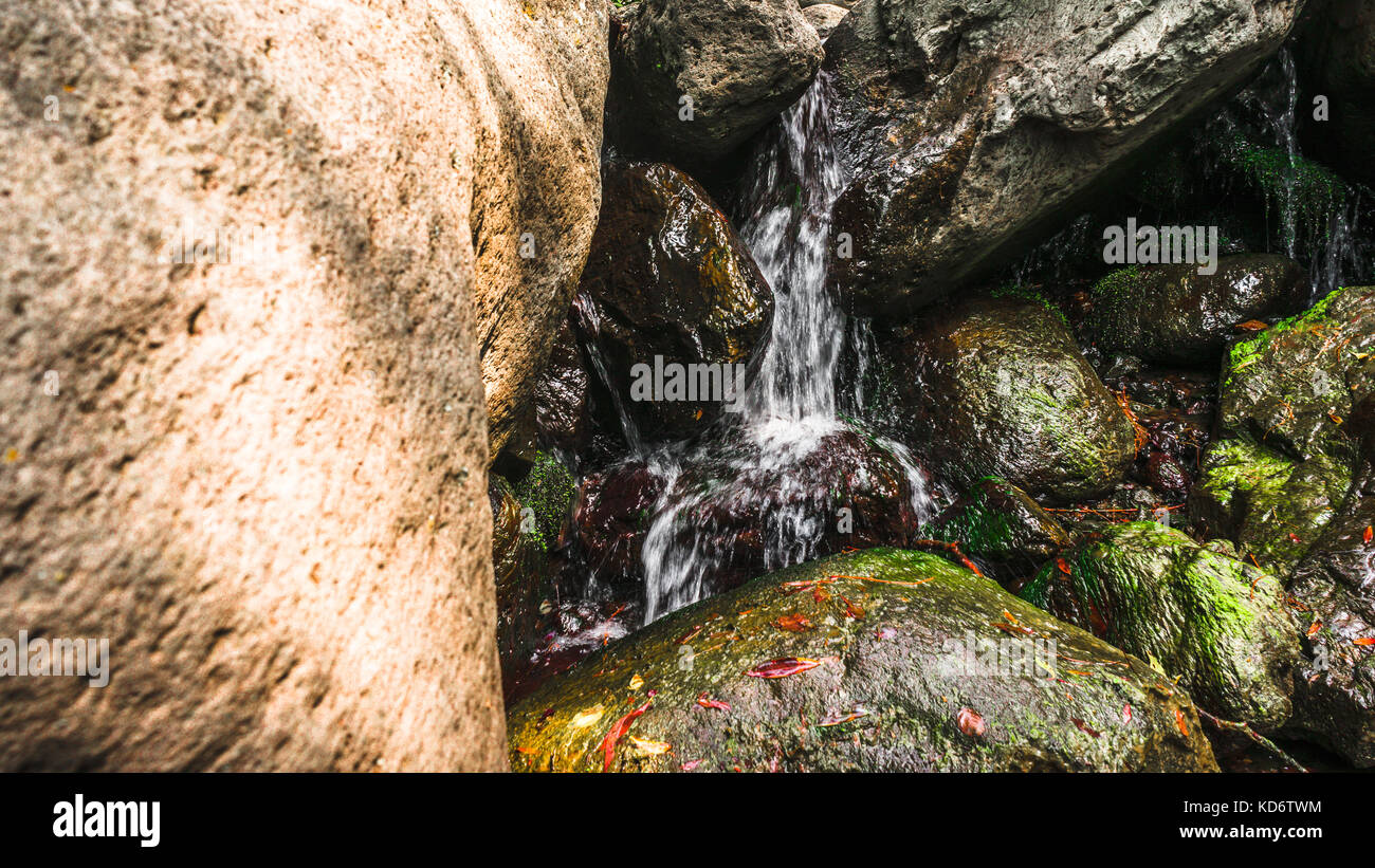 Fragment of mountain waterfall in Armenia side view horizontal Stock Photo