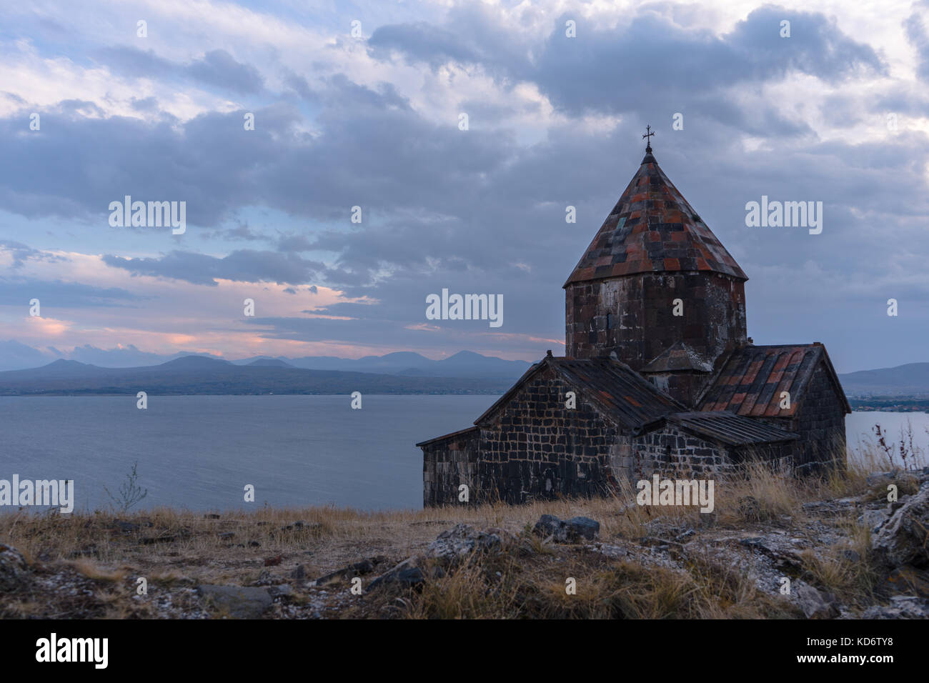Twilight on Lake Sevan in Armenia and Monastery horizontal Stock Photo