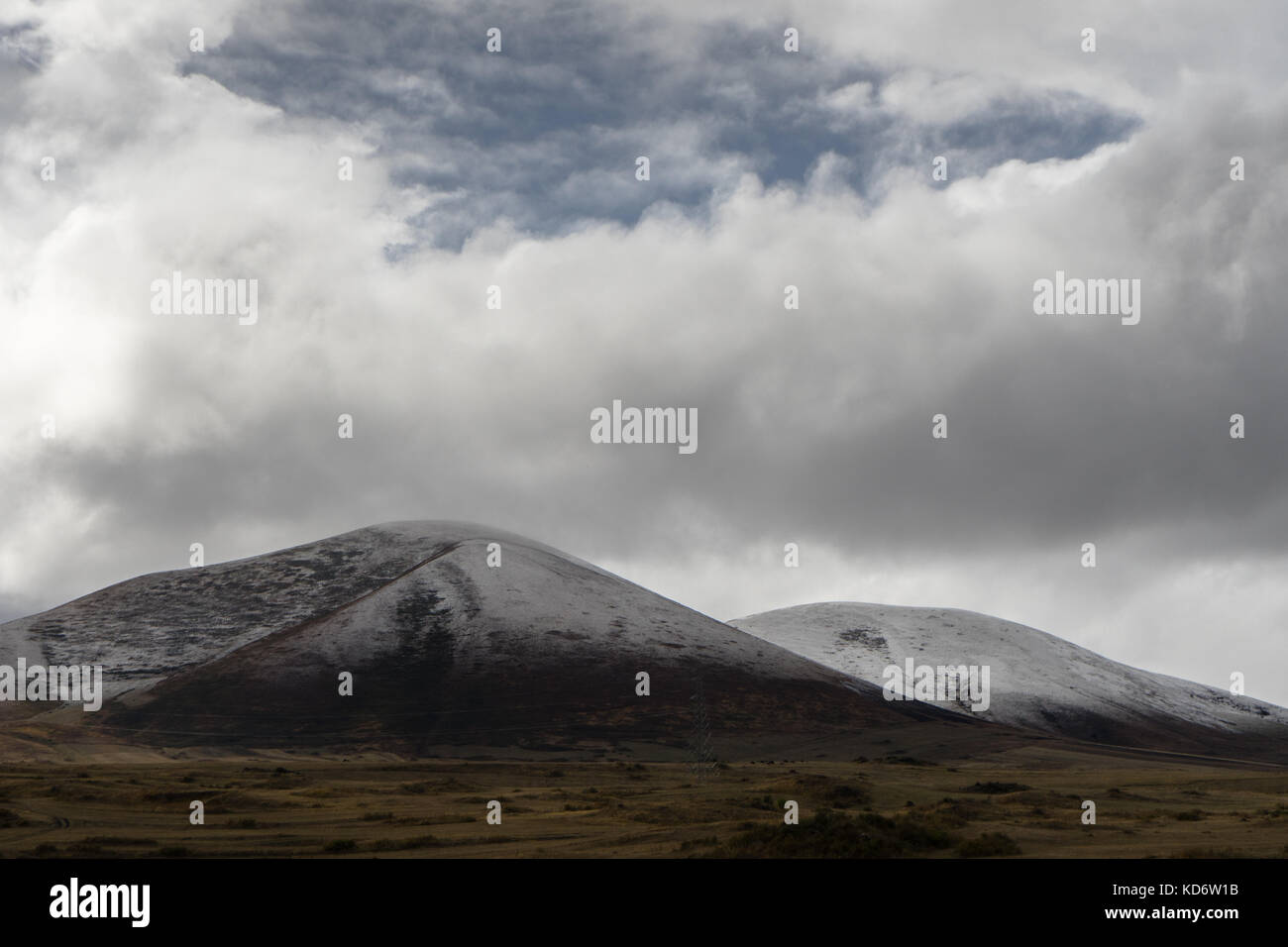 Valley, clouds and sky above the mountains in Armenia horizontal Stock Photo