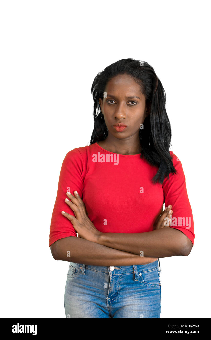 Frowning woman with arms folded Stock Photo