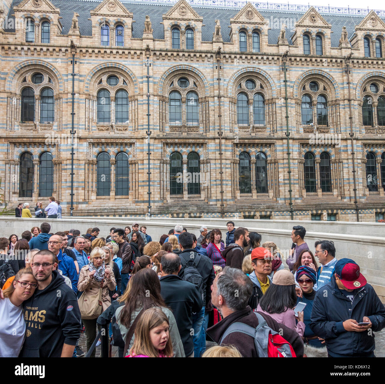 A queue of visitors waiting in line while security checks take place