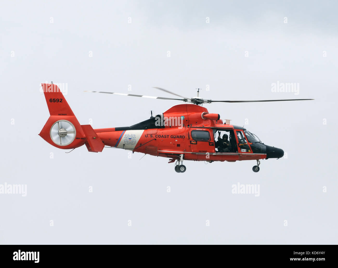 Detroit, USA - July 24, 2011: US Coast Guard helicopter departs on a patrol mission over the Great Lakes. The USCG covers large larts of the Canadian  Stock Photo