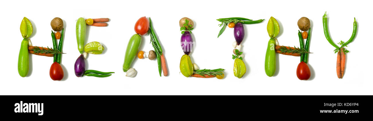 Word 'Healthy' written with vegetables as a  concept for healthy lifestyle, vegetarian or vegan diet, getting fit or reducing calories Stock Photo