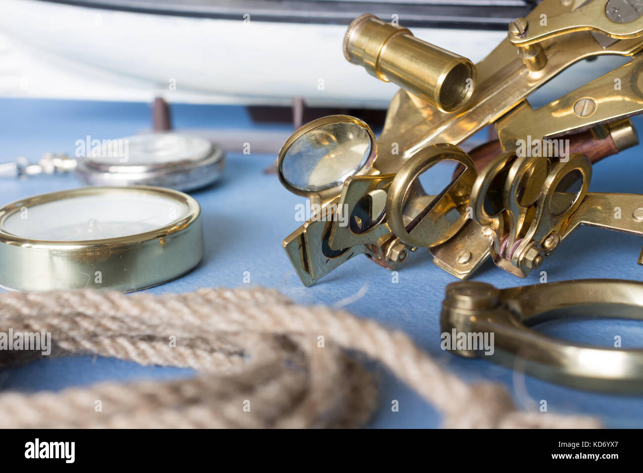 Various pieces of nautical equipment on blue background Stock Photo Alamy
