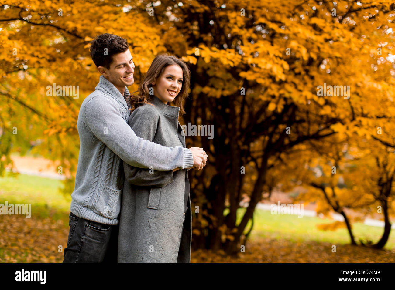 Young couple in love walking together in the park Stock Photo Alamy