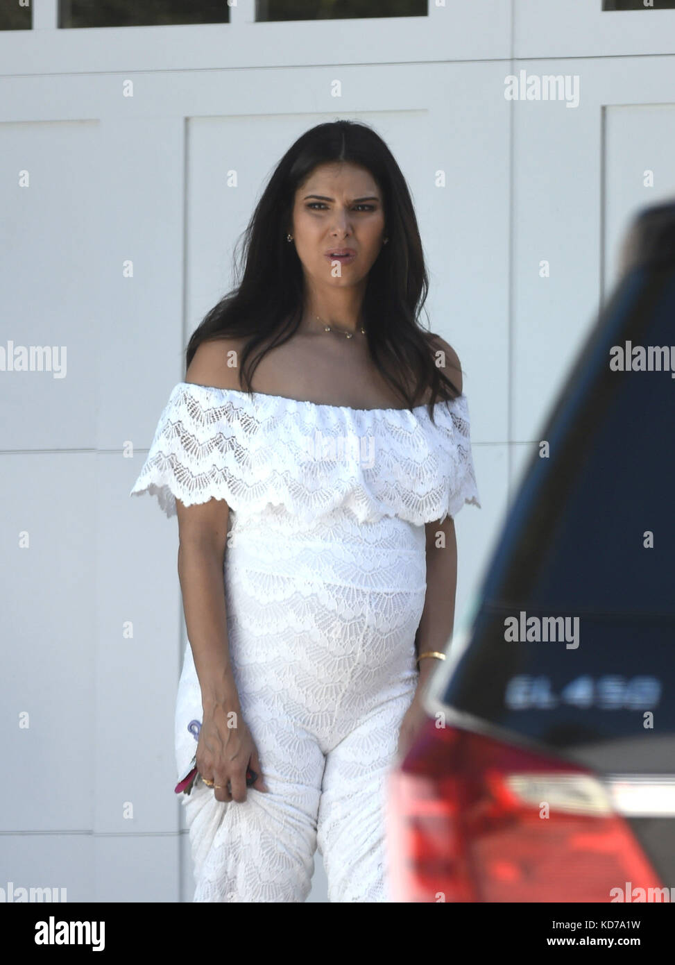 Roselyn Sanchez doesn't look too happy when she turns her truck around
