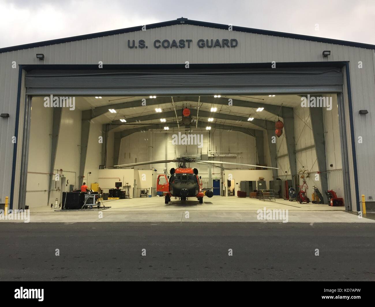 Coast Guard Air Station Kodiak MH-60 Jayhawk helicopter sits inside a hangar located in Cold Bay, Alaska, Oct. 5, 2017. Stock Photo