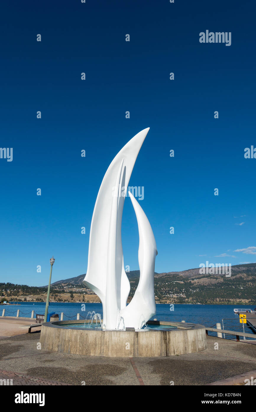 An iconic sculpture entitled The Spirit of Sail by Robert Dow Reidin on the Lake Okanagan waterfront in Kelowna British Columbia. Stock Photo