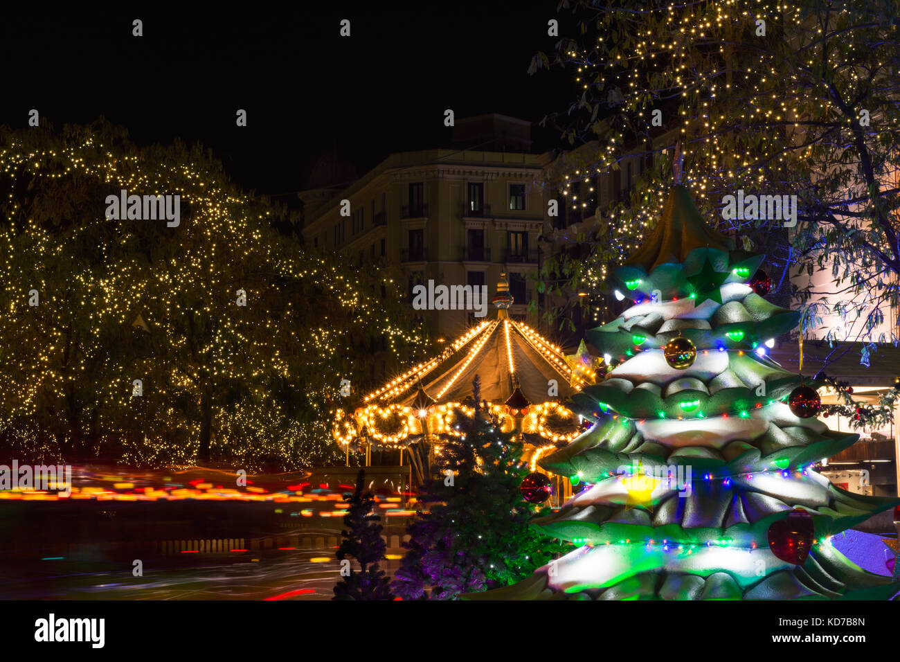Night image of christmas carousel, lights and Christmas tree Stock ...