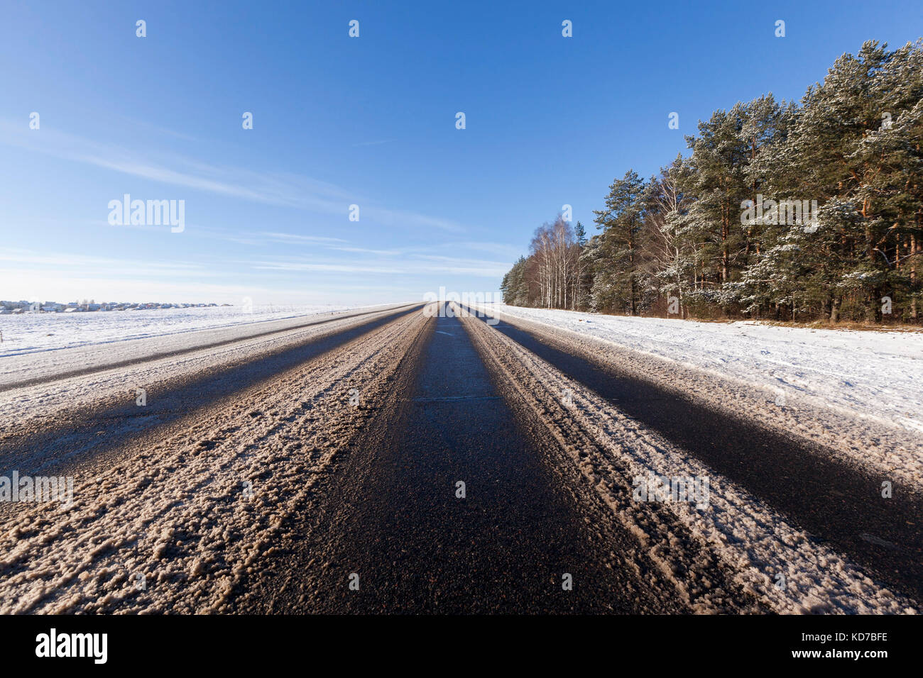 Asphalt road in winter Stock Photo - Alamy