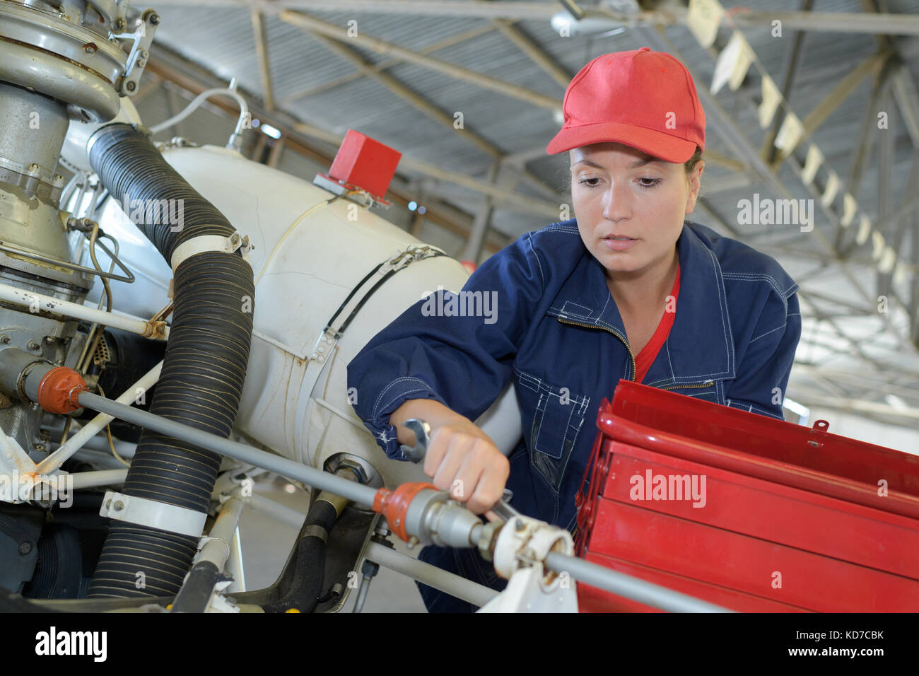 engineer maintaining a helicopter engine Stock Photo - Alamy