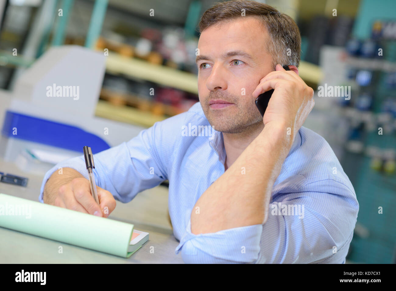Man taking order by telephone Stock Photo Alamy