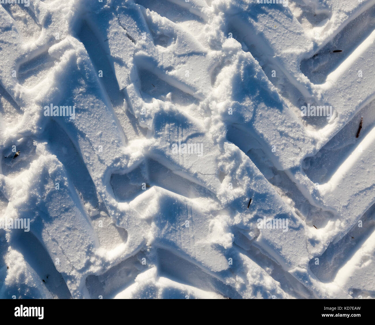 Traces of the car on the snow Stock Photo - Alamy