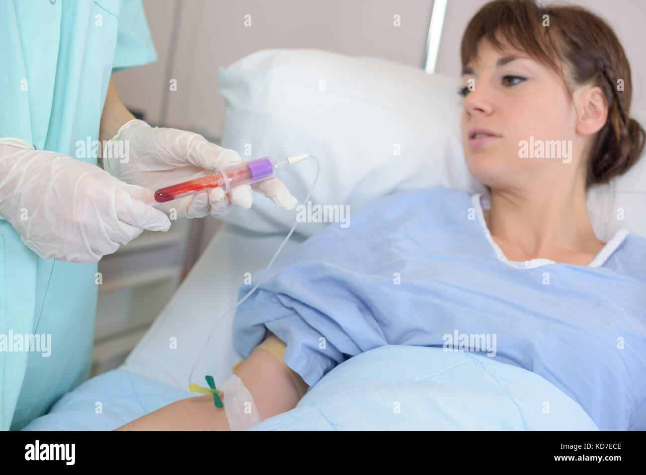 Female nurse takes blood hi res stock photography and images Alamy