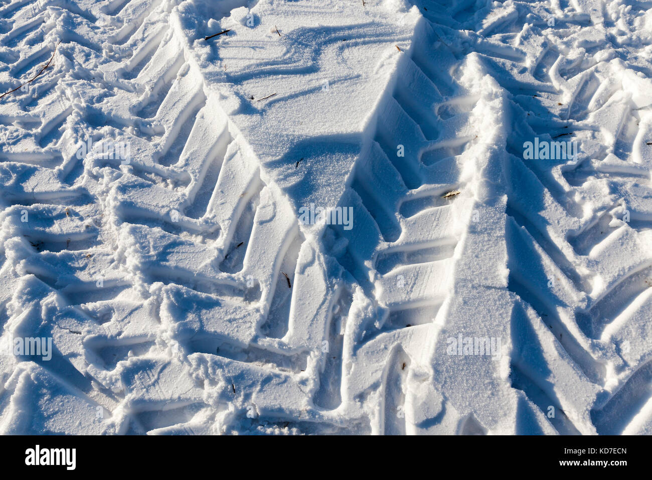 Traces of the car in the snow Stock Photo - Alamy