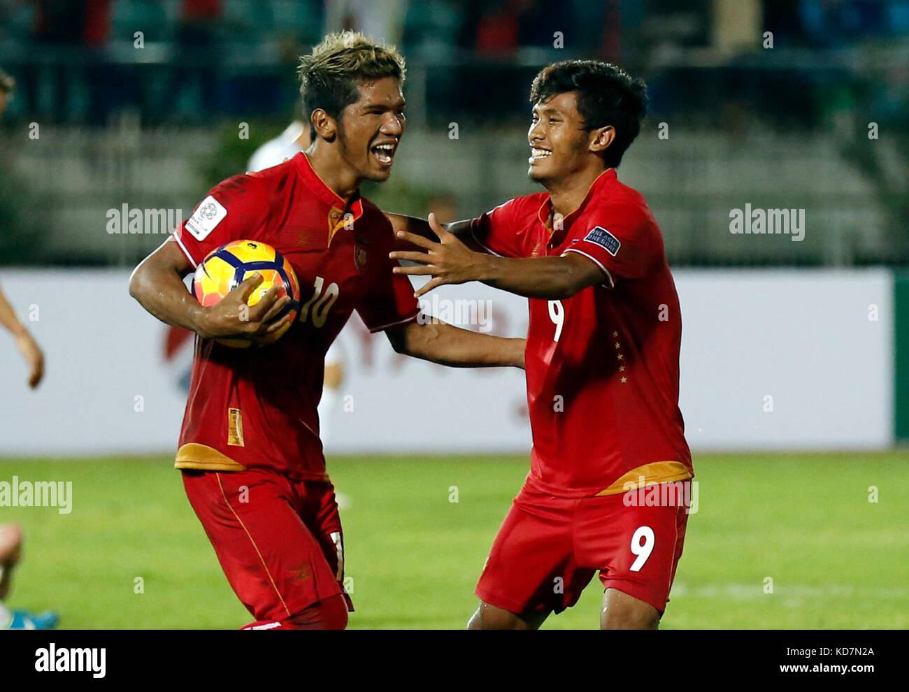 Yangon, Myanmar. 10th Oct, 2017. Kyaw Ko Ko (L) of Myanmar celebrates  scoring during the the AFC Asian Cup qualifiers final round Group A match  between Myanmar and Kazakhstan at the Thuwanna