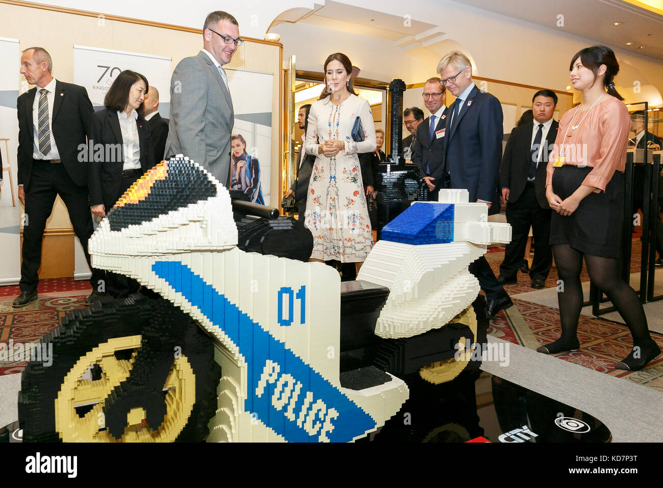 Tokyo, Japan. 11th Oct, 2017. Her Royal Highness the Crown Princess Mary Elizabeth Donaldson (C) looks at a Police motorcycle made of LEGO bricks on display during a business seminar at Hotel Gajoen Tokyo on October 11, 2017, Tokyo, Japan. The Danish Crown Prince Couple hope to cement business relationships between Japan and Denmark during their visit celebrating 150 years of Diplomatic relations between the two countries. Credit: Rodrigo Reyes Marin/AFLO/Alamy Live News Stock Photo