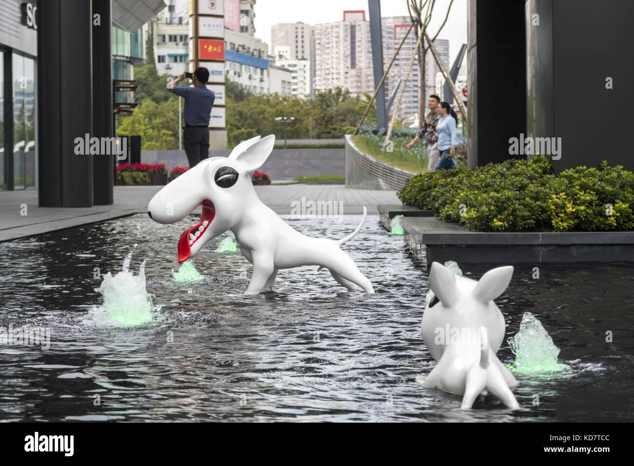 October 10, 2017 - Shanghai, Shanghai, China - Shanghai,CHINA-10th October 2017: (EDITORIAL USE ONLY. CHINA OUT)..Dog sculptures can be seen at an outdoor art installation in Shanghai. The art installation is designed by Chinese artist Seung Koo Lee. (Credit Image: © SIPA Asia via ZUMA Wire) Stock Photo