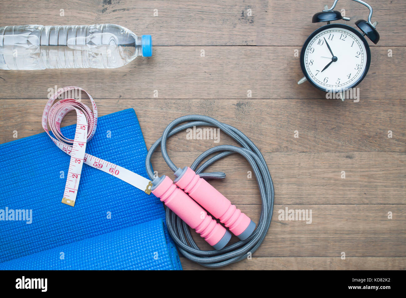 Yoga Mat And Sport Equipment With Measuring Tape Water And