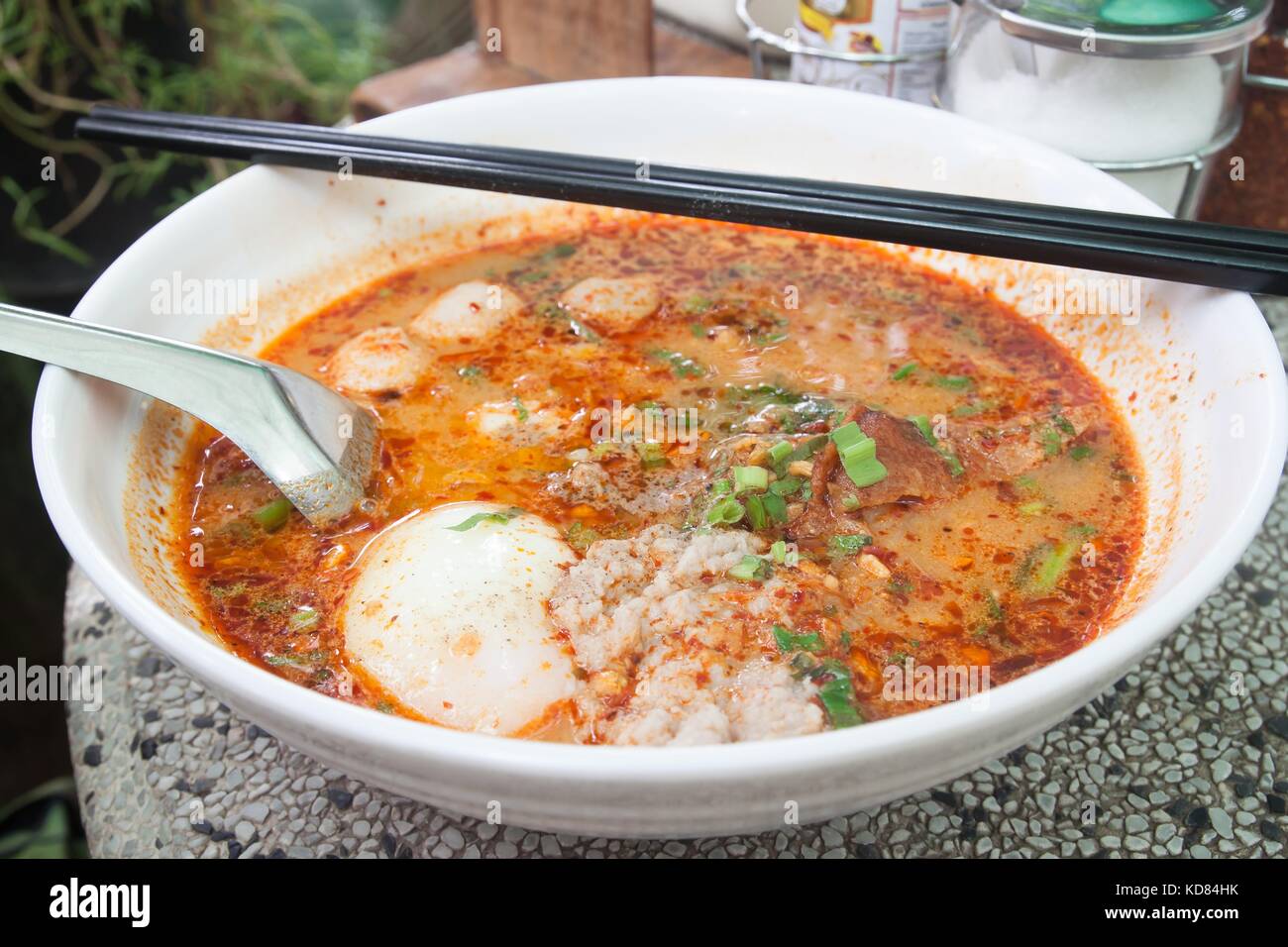 Spicy noodles soup with egg Stock Photo - Alamy