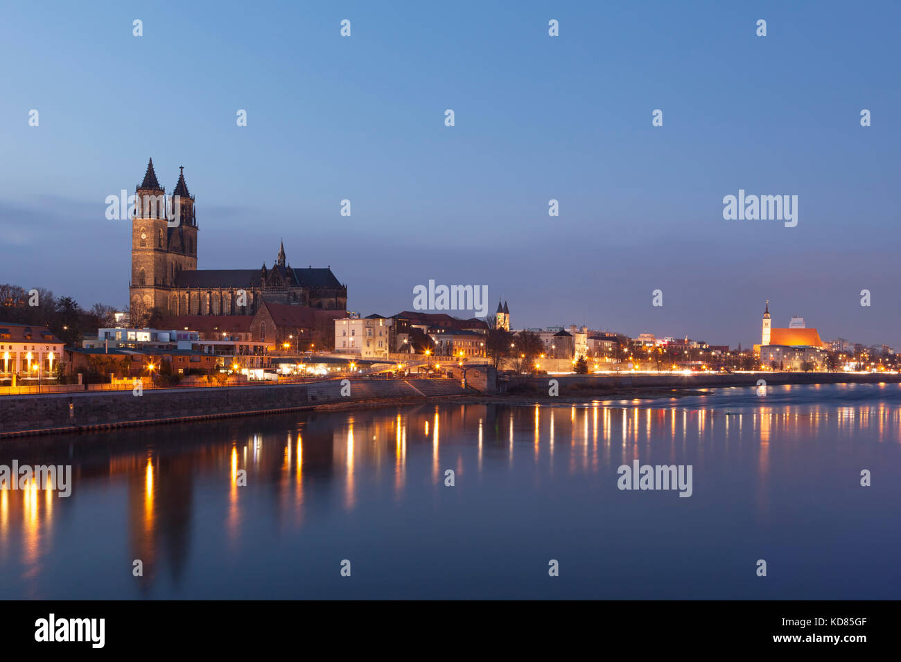Skyline Of Magdeburg On The Elbe River At Dusk Stock Photo