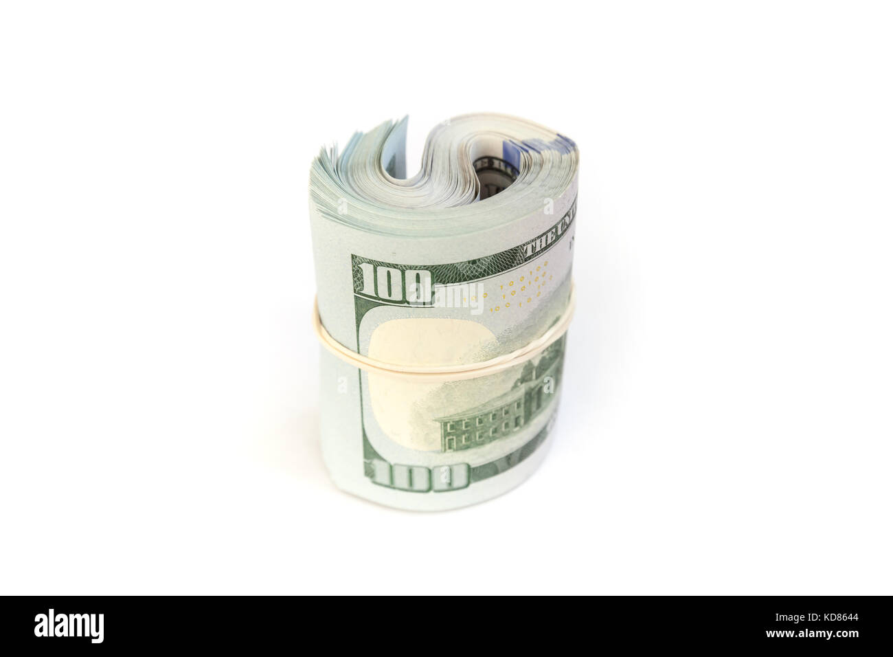 US official currency, roll of One Hundred Dollars stands isolated on white background with soft shadow Stock Photo