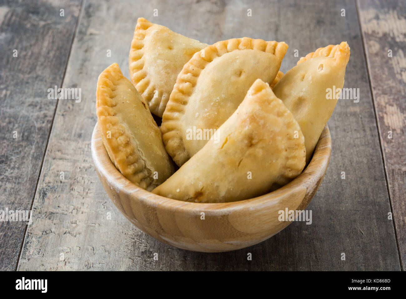 Typical Spanish empanadas on wooden table Stock Photo Alamy