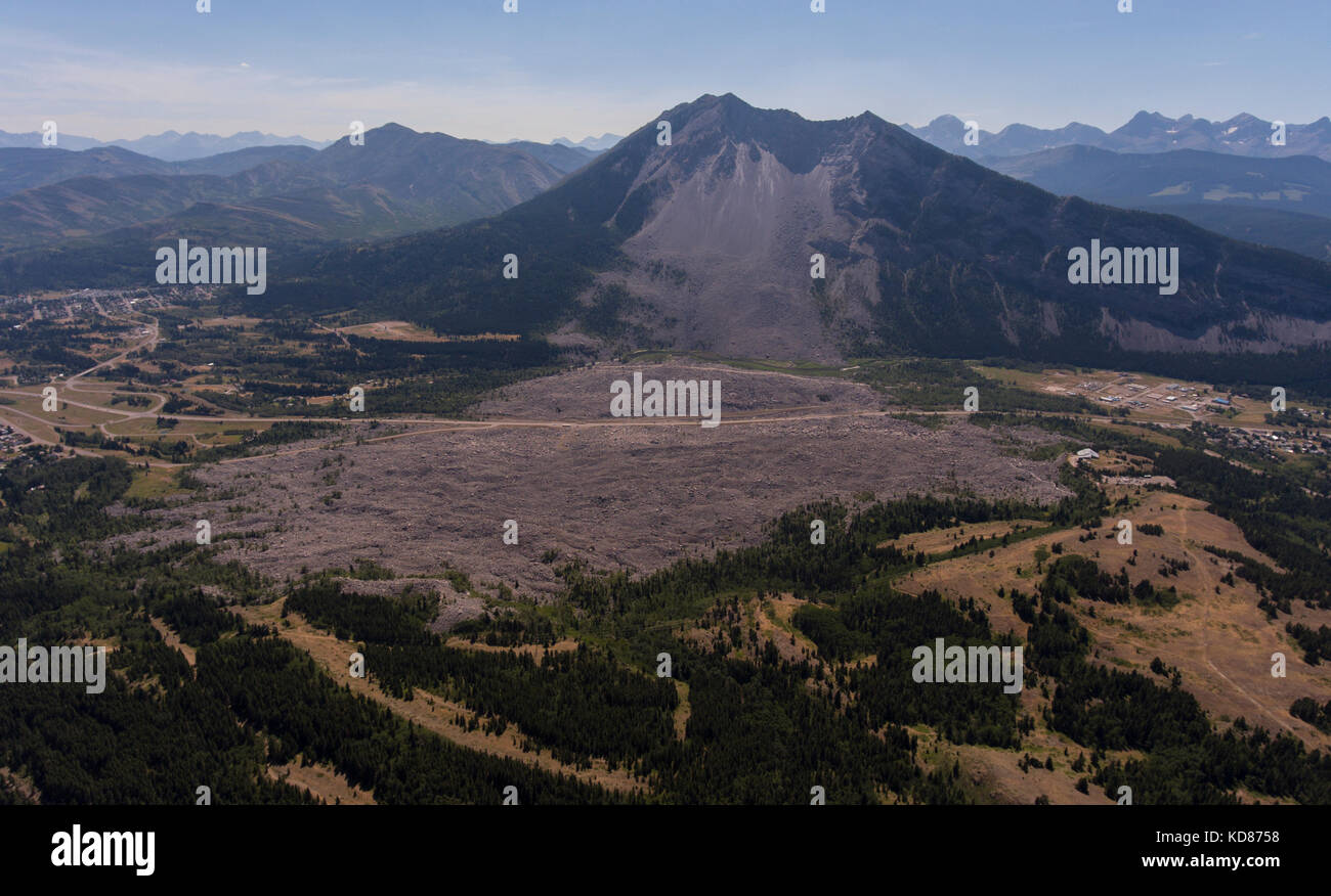 oblique aerial view of Turtle Mountain and the deadly 1903 Frank slide with Highway 3 cut across it, Municipality of Crows Nest Pass, Alberta, Canada Stock Photo
