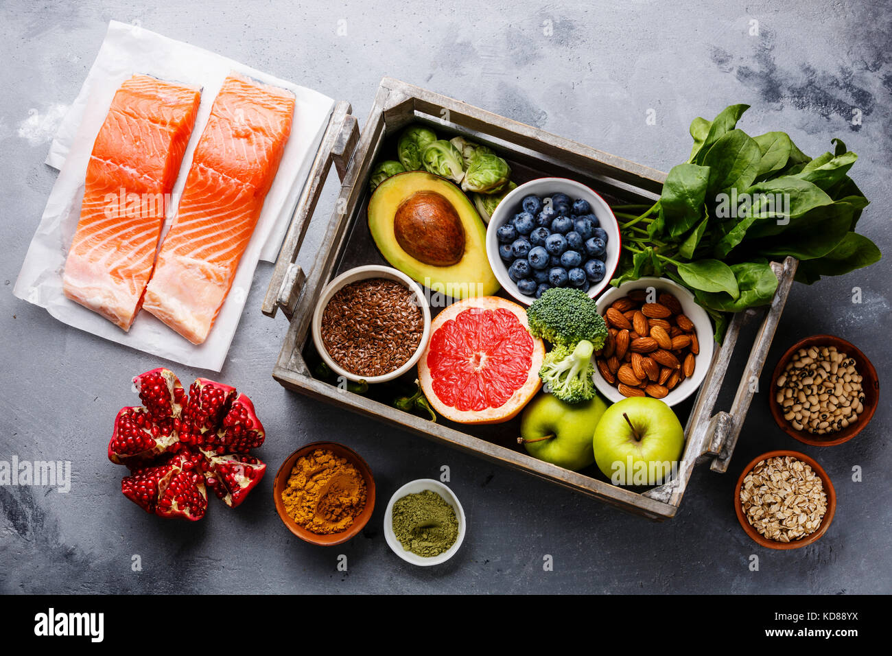 Healthy food clean eating selection in wooden box fish, fruit