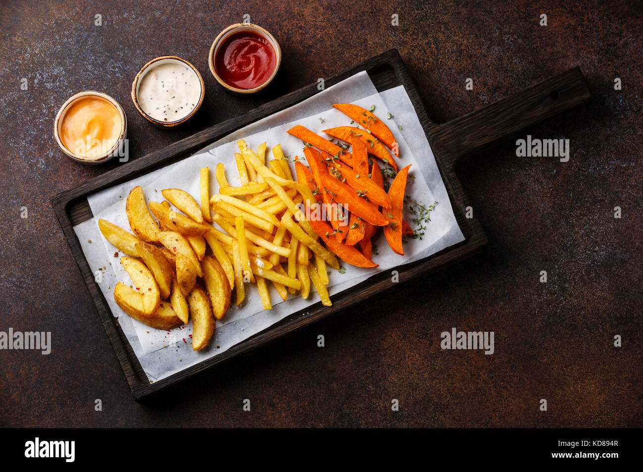 Variety of potatoes for garnish potato wedges, french fries, sweet