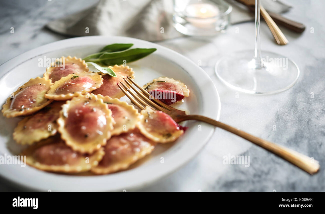 Beet & goat cheese ravioli with fresh sage and brown butter sauce