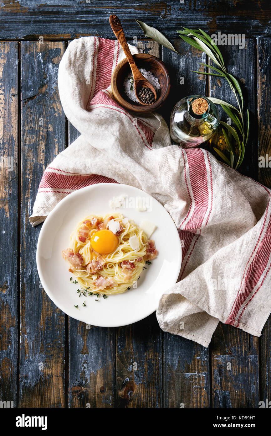 Italian traditional pasta alla carbonara with yolk, pancetta bacon