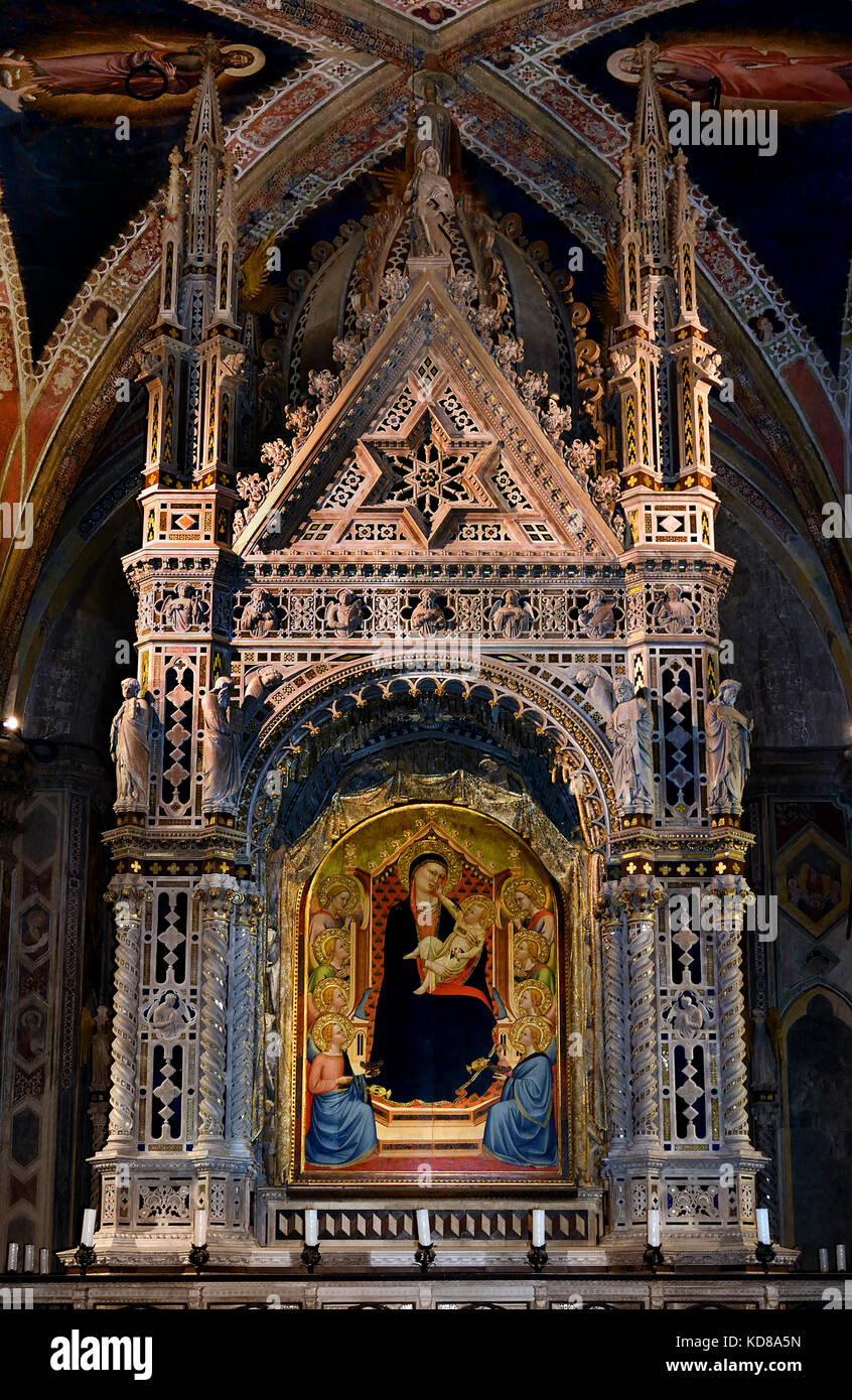 Tabernacle by Andrea Orcagna - c. 1359 Madonna by Bernardo Daddi - c. 1346 Orsanmichele ( or Kitchen Garden of St. Michael ) is a church in Florence ( In 1336 as a market and grain storage area, as on commission of the Silk guild (silk union). Stock Photo